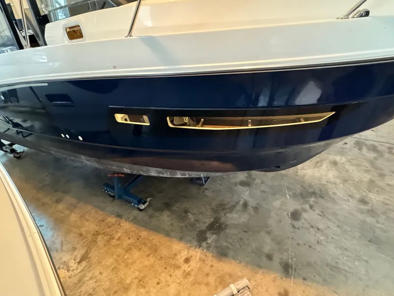 Slide: The Image of 2022 Beneteau Antares 9 boat roof with skylight in showroom. - 10