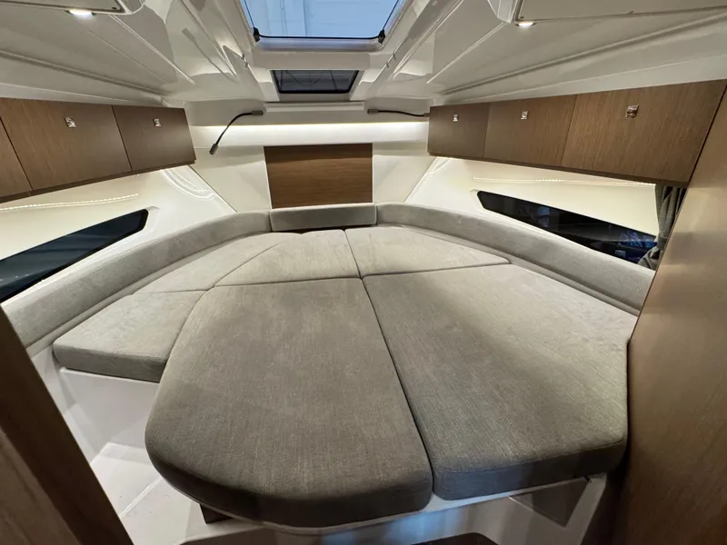 Slide: The Image of Interior view of 2022 Beneteau Antares 9 boat cockpit with navigation system. - 18