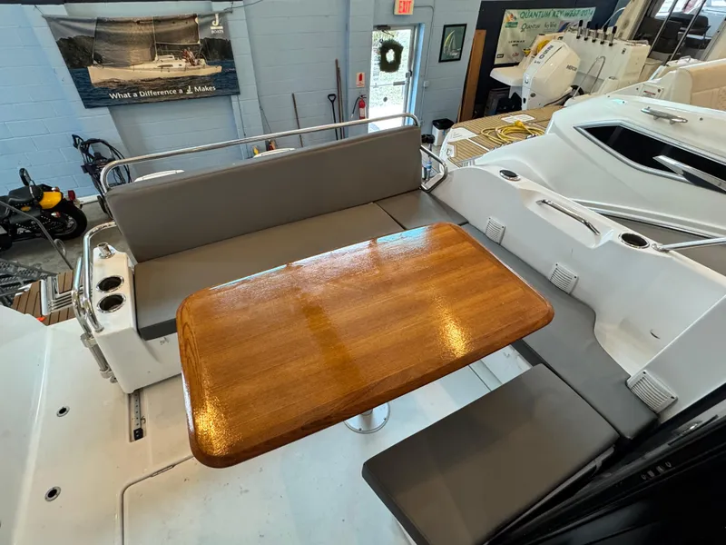 Slide: The Image of Interior of 2022 Beneteau Antares 9 with dining area and seating. - 20