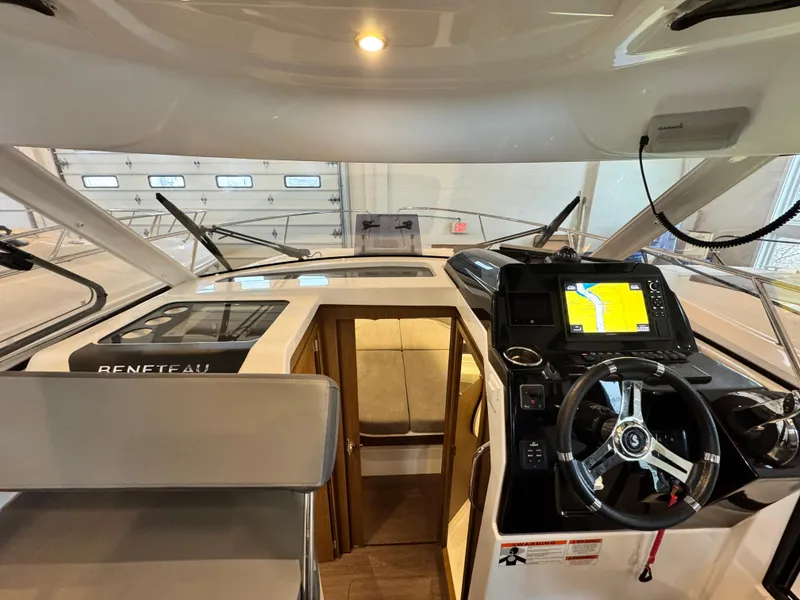 Slide: The Image of Interior view of 2022 Beneteau Antares 9, showcasing storage compartments and modern design. - 22