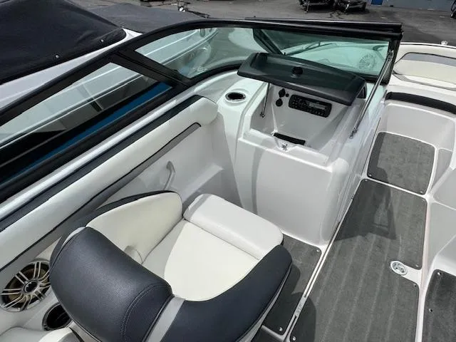 Slide: The Image of 2017 Yamaha SX195 boat interior with sleek seating and modern dashboard design. - 14