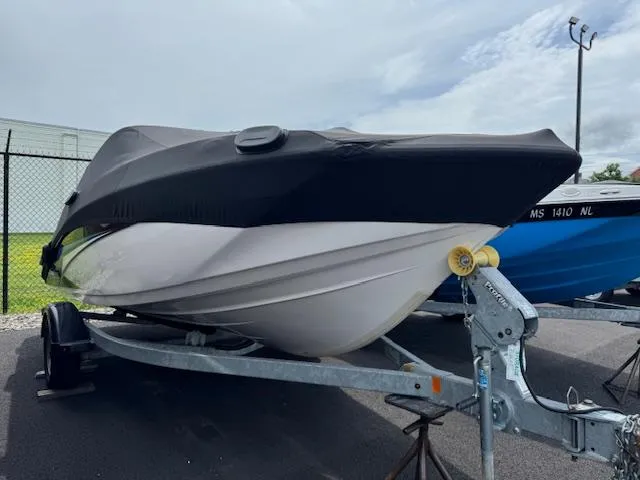 Slide: The Image of 2017 Yamaha Boats SX195 on trailer, covered, parked outdoors. - 3