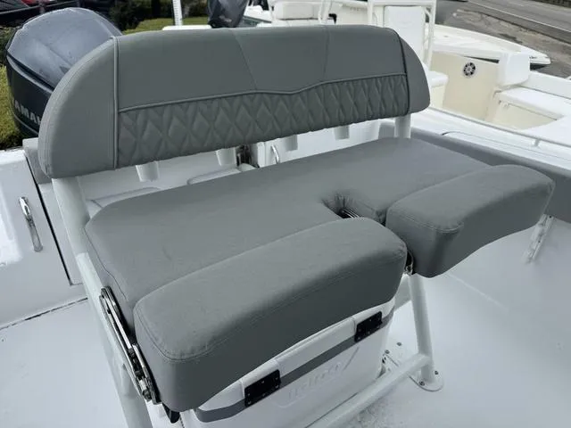 Slide: The Image of 2025 Wellcraft 223 Fisherman boat seat, gray upholstery, modern design. - 9