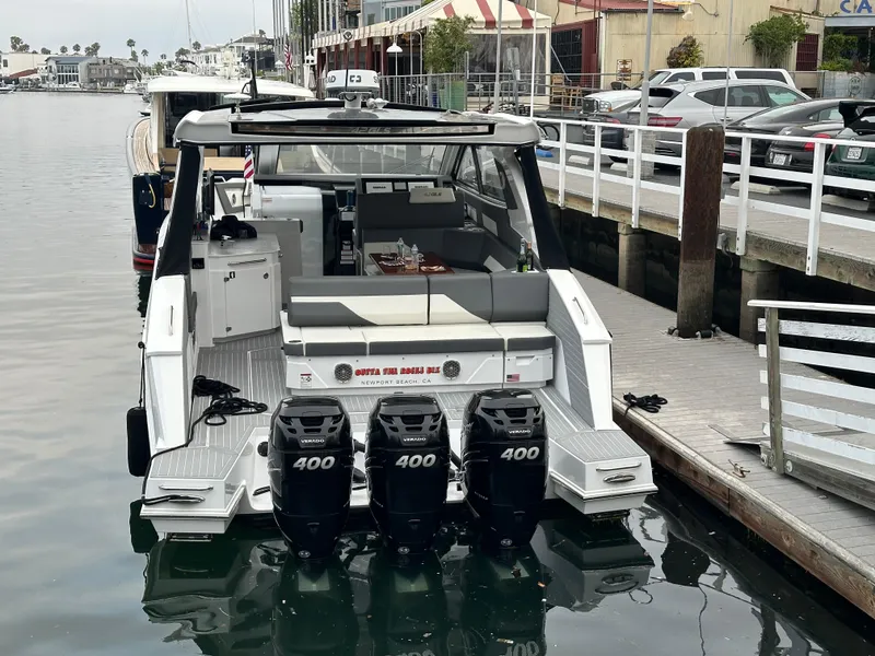 Slide: The Image of 2021 Cruisers Yachts 42 GLS OB docked with four powerful outboard engines. - 20