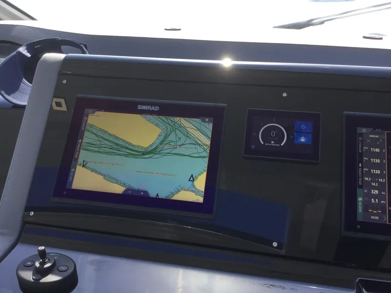 Slide: The Image of Simrad navigation display on 2021 Cruisers Yachts 42 GLS OB dashboard. - 22