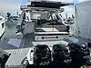 Slide: The Image of 2021 Cruisers Yachts 42 GLS OB with triple outboard engines, docked at marina. - 25