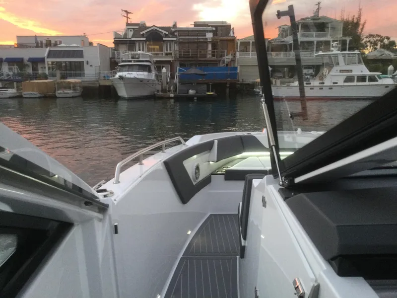 Slide: The Image of 2021 Cruisers Yachts 42 GLS OB at marina during sunset. - 35
