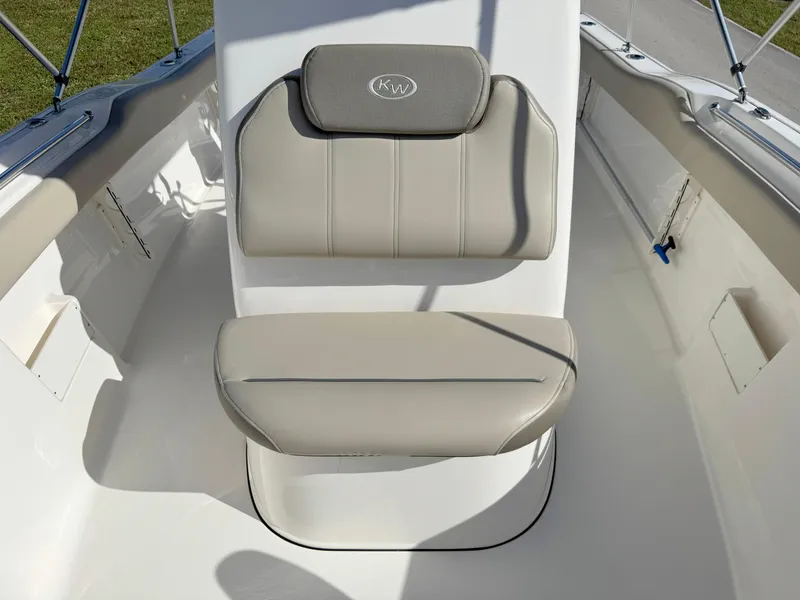 Slide: The Image of 2023 Key West 239 FS boat interior with cushioned seating. - 13
