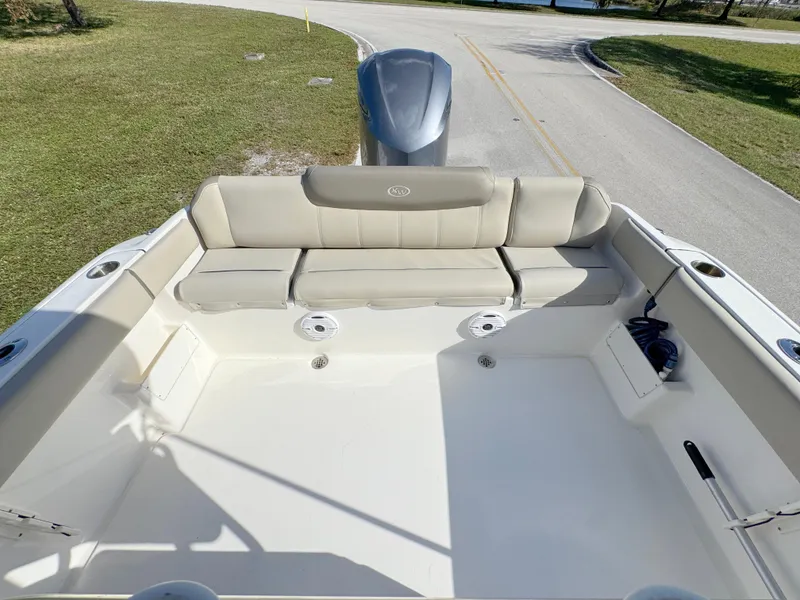 Slide: The Image of 2023 Key West 239 FS boat with spacious seating and clean deck design. - 25