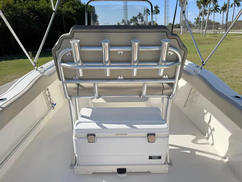 Slide: The Image of 2023 Key West 239 FS boat interior with rod holders and cooler. - 30