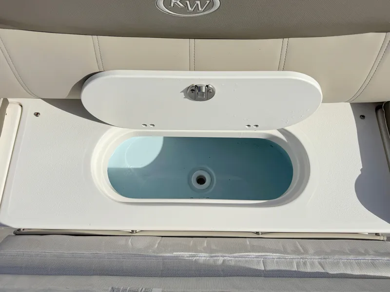 Slide: The Image of 2023 Key West 239 FS boat livewell with open lid. - 31
