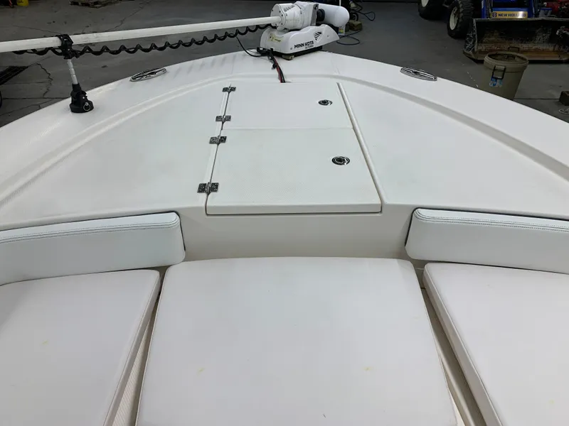 Slide: The Image of 2019 Robalo 246 Cayman boat deck with storage compartments and seating. - 29