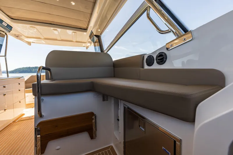 Slide: The Image of Luxurious interior of 2025 Nimbus W11 boat with comfortable seating and modern design. - 15