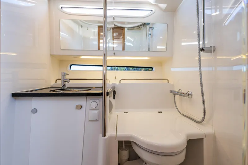Slide: The Image of Modern bathroom interior in 2025 Nimbus W11 yacht, featuring sleek design and compact amenities. - 29