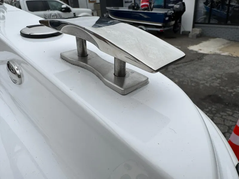 Slide: The Image of Close-up of 2025 Four Winns H2 OB boat cleat on white surface. - 17
