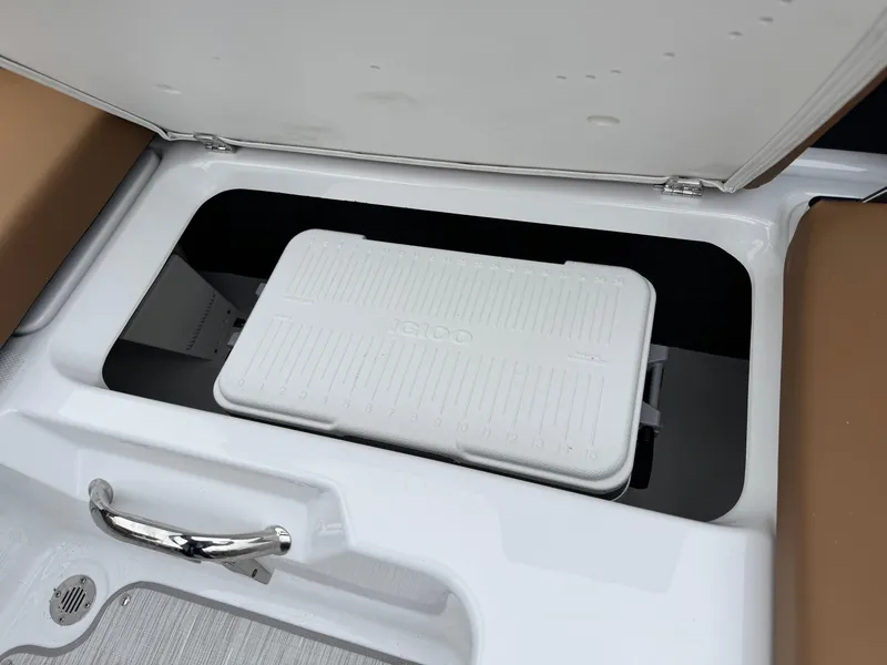 Slide: The Image of 2025 Four Winns H2 OB boat storage compartment with cooler. - 21