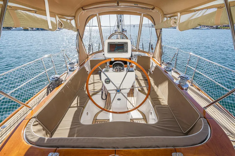 Slide: The Image of Luxurious 2012 Hylas 46 yacht cockpit with wooden wheel and navigation system. - 15