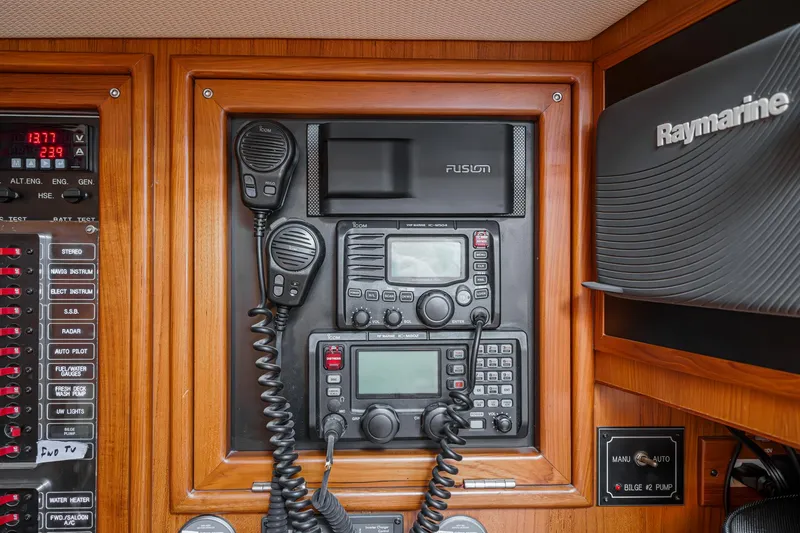 Slide: The Image of Hylas 46 yacht communication panel with radios and navigation equipment, 2012 model. - 27