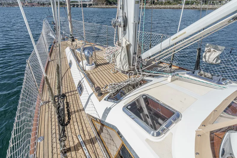 Slide: The Image of Deck view of 2012 Hylas 46 sailboat with rigging and netting. - 5