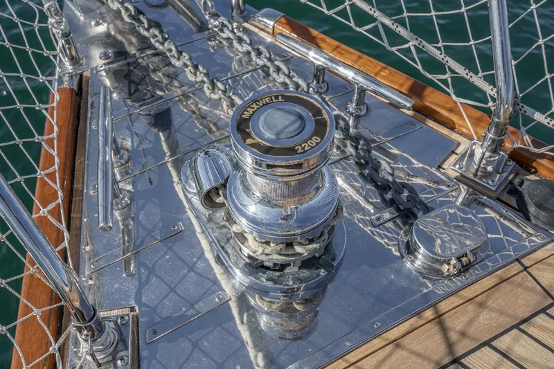 Slide: The Image of Close-up of a 2012 Hylas 46 yacht's anchor windlass and chain on deck. - 9