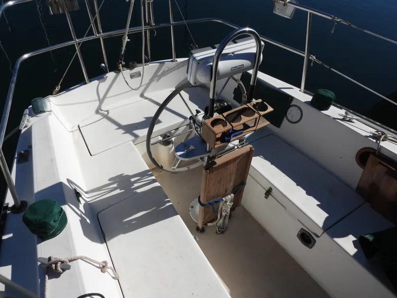 Slide: The Image of Cockpit of a 1983 Catalina 30 sailboat with steering wheel. - 2