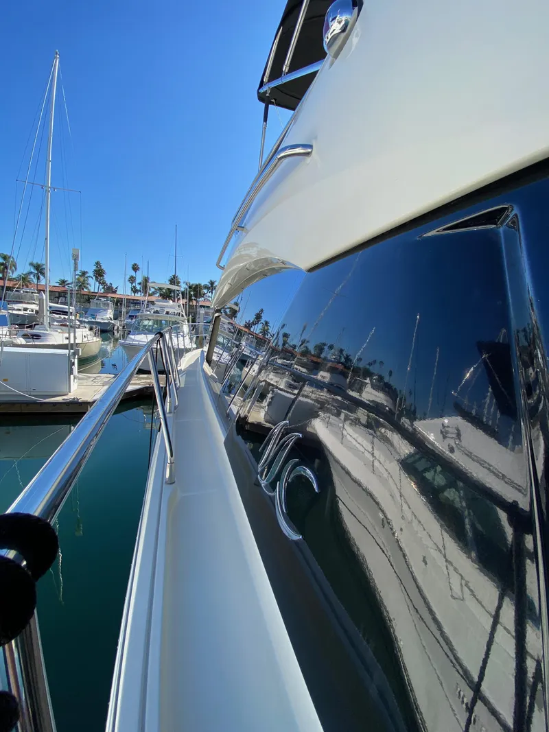 Slide: The Image of 2017 Beneteau Monte Carlo 5 MC5 yacht docked in sunny marina. - 19