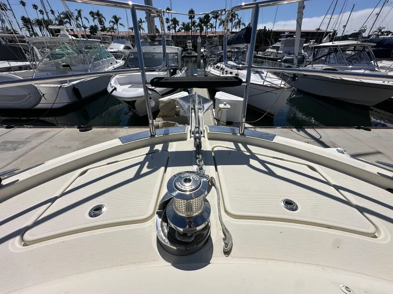 Slide: The Image of 2017 Beneteau Monte Carlo 5 MC5 yacht bow at marina, surrounded by boats. - 22
