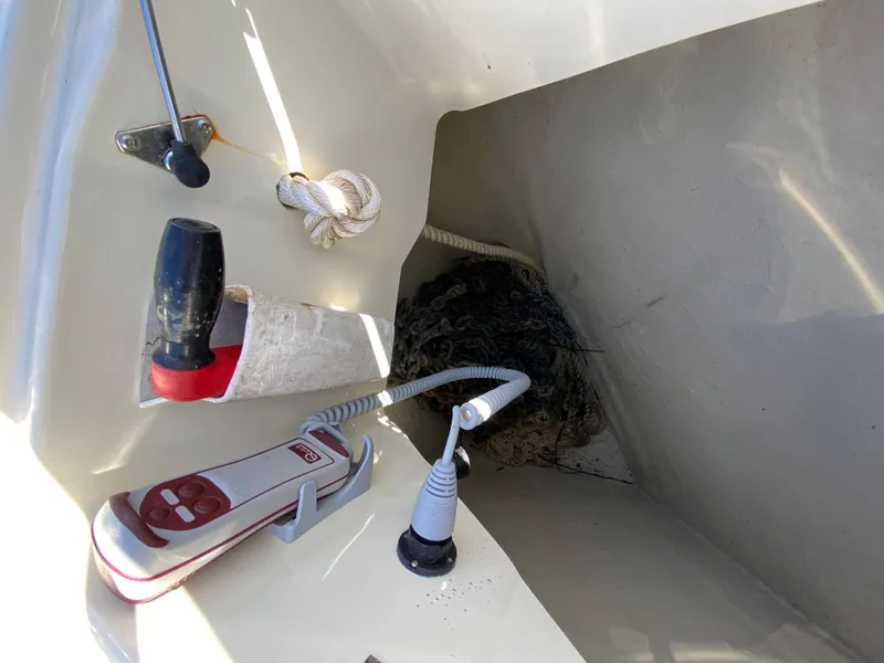 Slide: The Image of Beneteau Monte Carlo 5 MC5 2017 boat storage compartment with rope and equipment. - 26