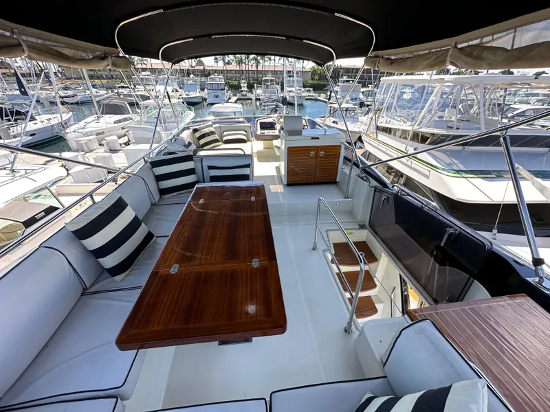 Slide: The Image of Luxurious 2017 Beneteau Monte Carlo 5 MC5 yacht interior with elegant seating and dining area. - 43