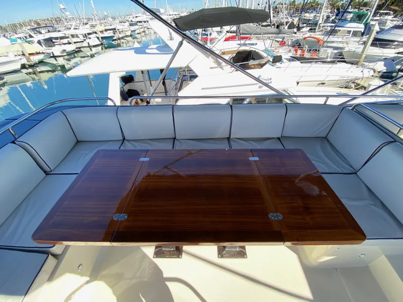 Slide: The Image of Luxurious seating area on 2017 Beneteau Monte Carlo 5 MC5 yacht at marina. - 45