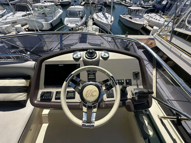 Slide: The Image of Cockpit view of 2017 Beneteau Monte Carlo 5 MC5 yacht at marina. - 49