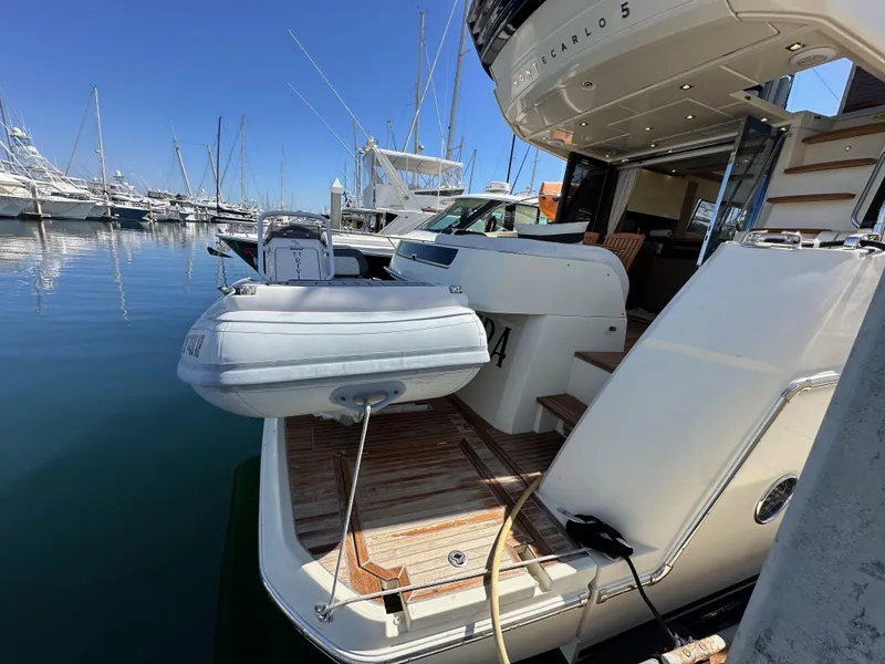 Slide: The Image of 2017 Beneteau Monte Carlo 5 MC5 yacht docked with inflatable boat. - 6