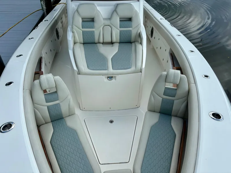 Slide: The Image of 2020 Solace 345 CC boat interior with luxurious seating and modern design. - 4