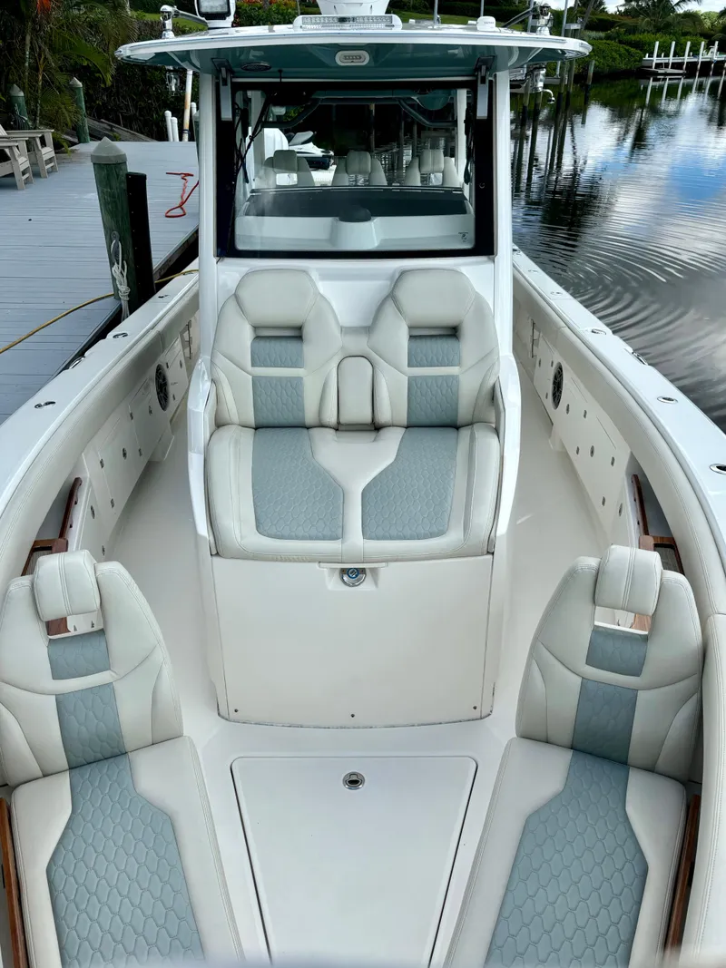 Slide: The Image of 2020 Solace 345 CC boat with luxurious seating and sleek design. - 5