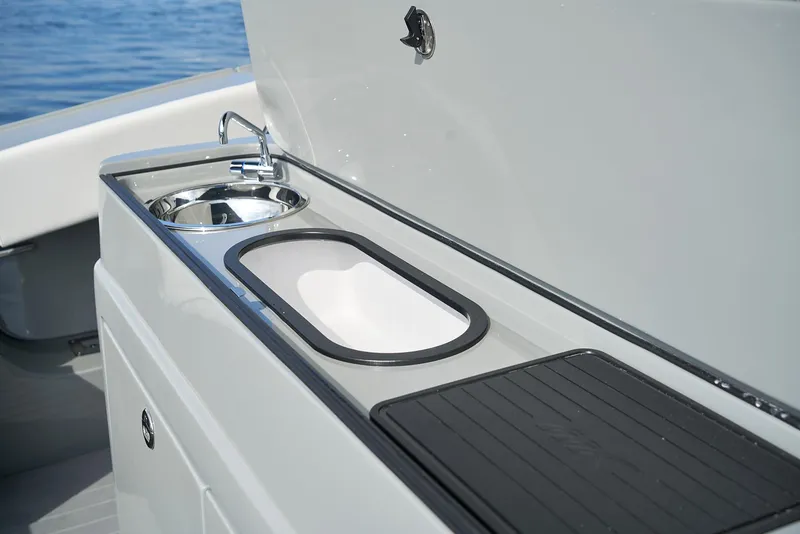 Slide: The Image of 2021 Midnight Express 43 Open yacht sink and counter detail. - 7