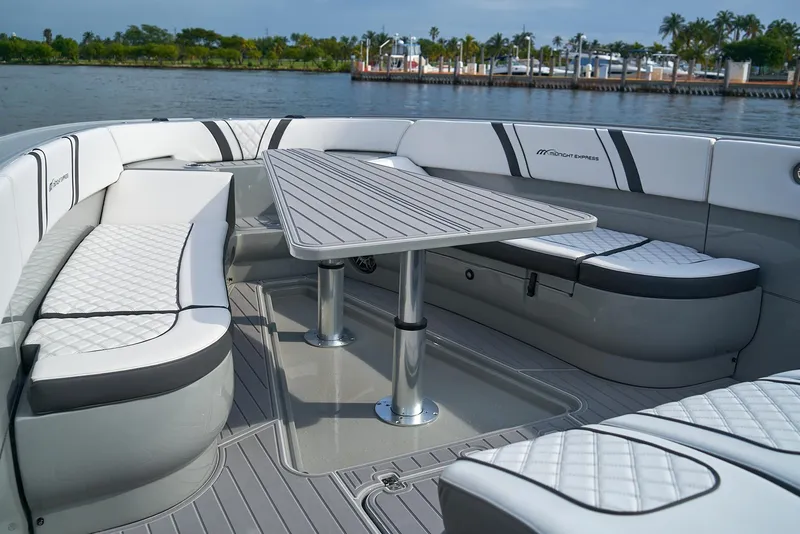 Slide: The Image of Luxurious seating area on 2021 Midnight Express 43 Open boat. - 9