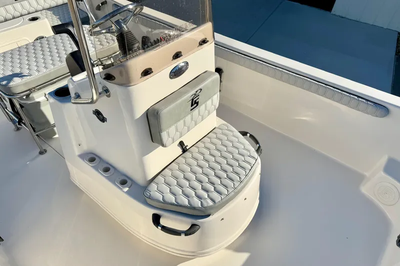 Slide: The Image of 2025 Carolina Skiff 21 LS boat interior with steering console and seating. - 12