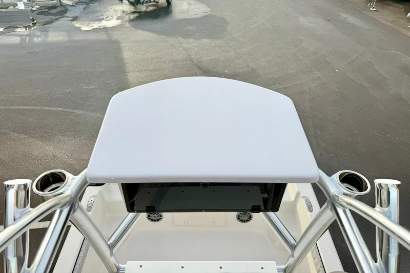 Slide: The Image of 2025 Carolina Skiff 21 LS boat console with T-top and rod holders. - 20