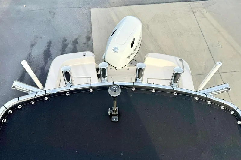 Slide: The Image of 2025 Carolina Skiff 21 LS boat with Suzuki outboard motor, viewed from above. - 23