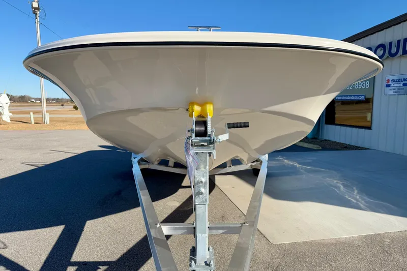 Slide: The Image of 2025 Carolina Skiff 21 LS boat displayed at Stroud Son Marine dealership. - 7