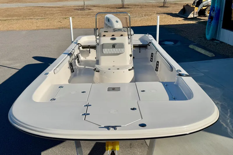 Slide: The Image of 2025 Carolina Skiff 21 LS boat on trailer, front view at dealership. - 8