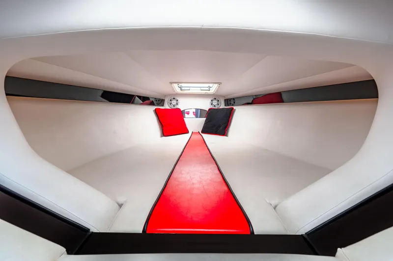 Slide: The Image of Interior of 2003 Donzi 33 ZX Daytona boat with red and black accents. - 18