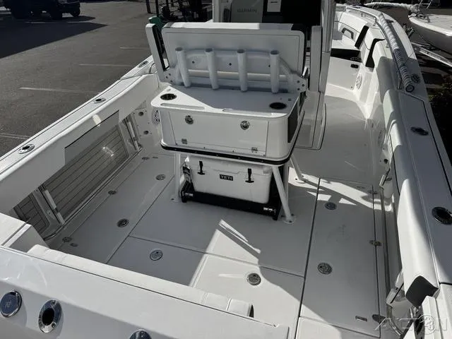 Slide: The Image of 2025 Blackfin 252CC boat interior with seating and storage compartments. - 10