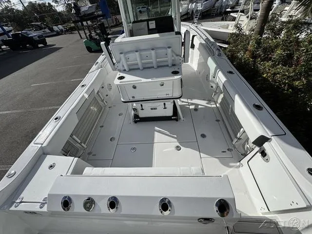 Slide: The Image of 2025 Blackfin 252CC boat interior with spacious deck and seating. - 12