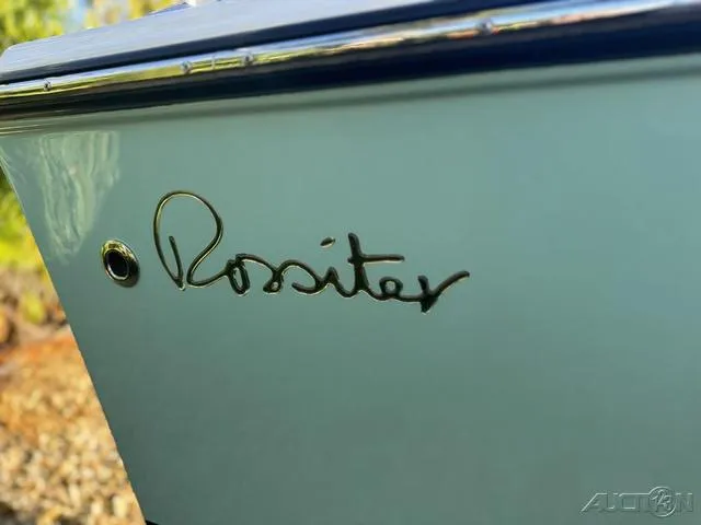 Slide: The Image of Close-up of 2025 Rossiter 20 boat logo on hull. - 6