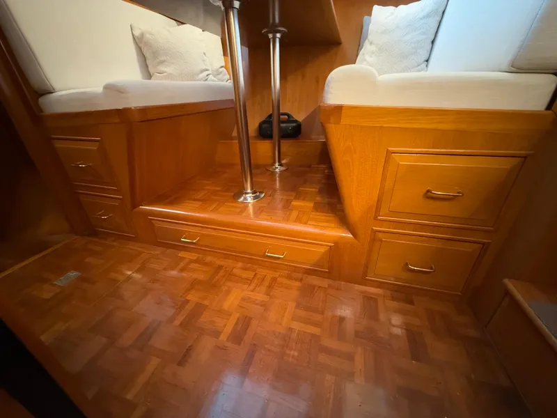 Slide: The Image of Interior of 1988 Ocean Alexander 42 CPMY with wooden cabinetry and seating. - 25