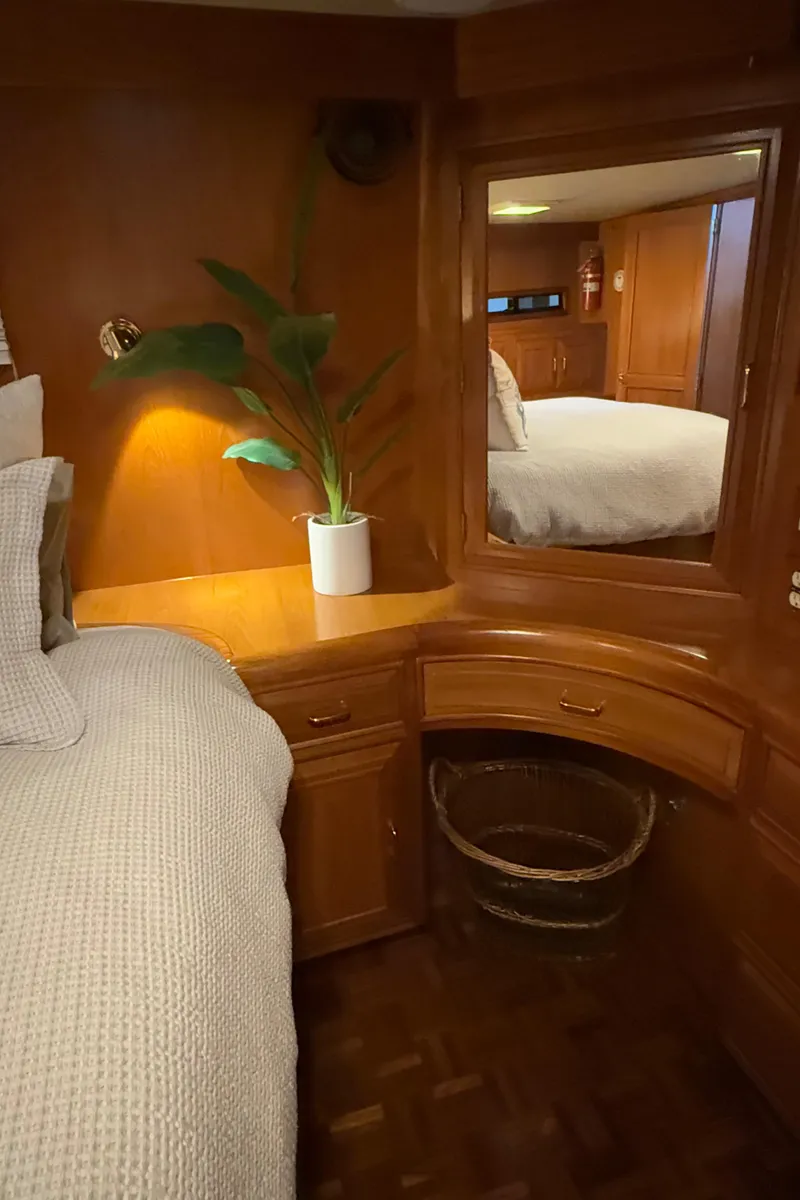 Slide: The Image of Ocean Alexander 42 CPMY 1988 yacht interior with wooden cabinetry and cozy bed. - 27