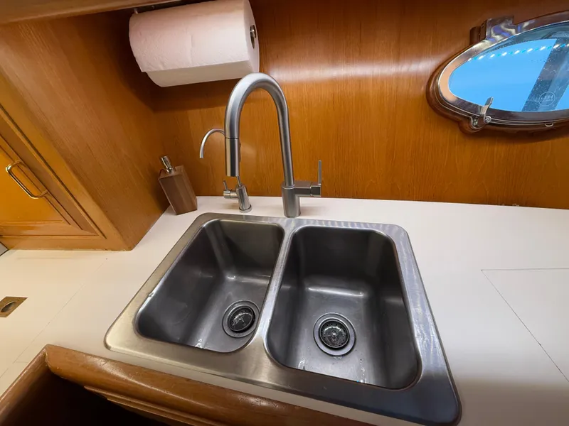 Slide: The Image of Stainless steel double sink in 1988 Ocean Alexander 42 CPMY yacht kitchen. - 31