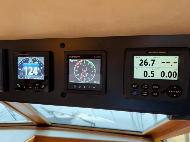 Slide: The Image of Control panel of 1988 Ocean Alexander 42 CPMY yacht with digital displays. - 37