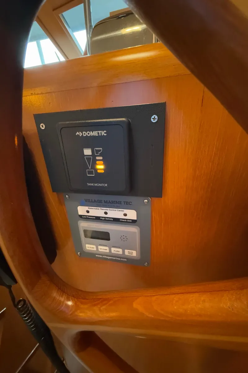 Slide: The Image of Control panel on 1988 Ocean Alexander 42 CPMY yacht, featuring Dometic system. - 39